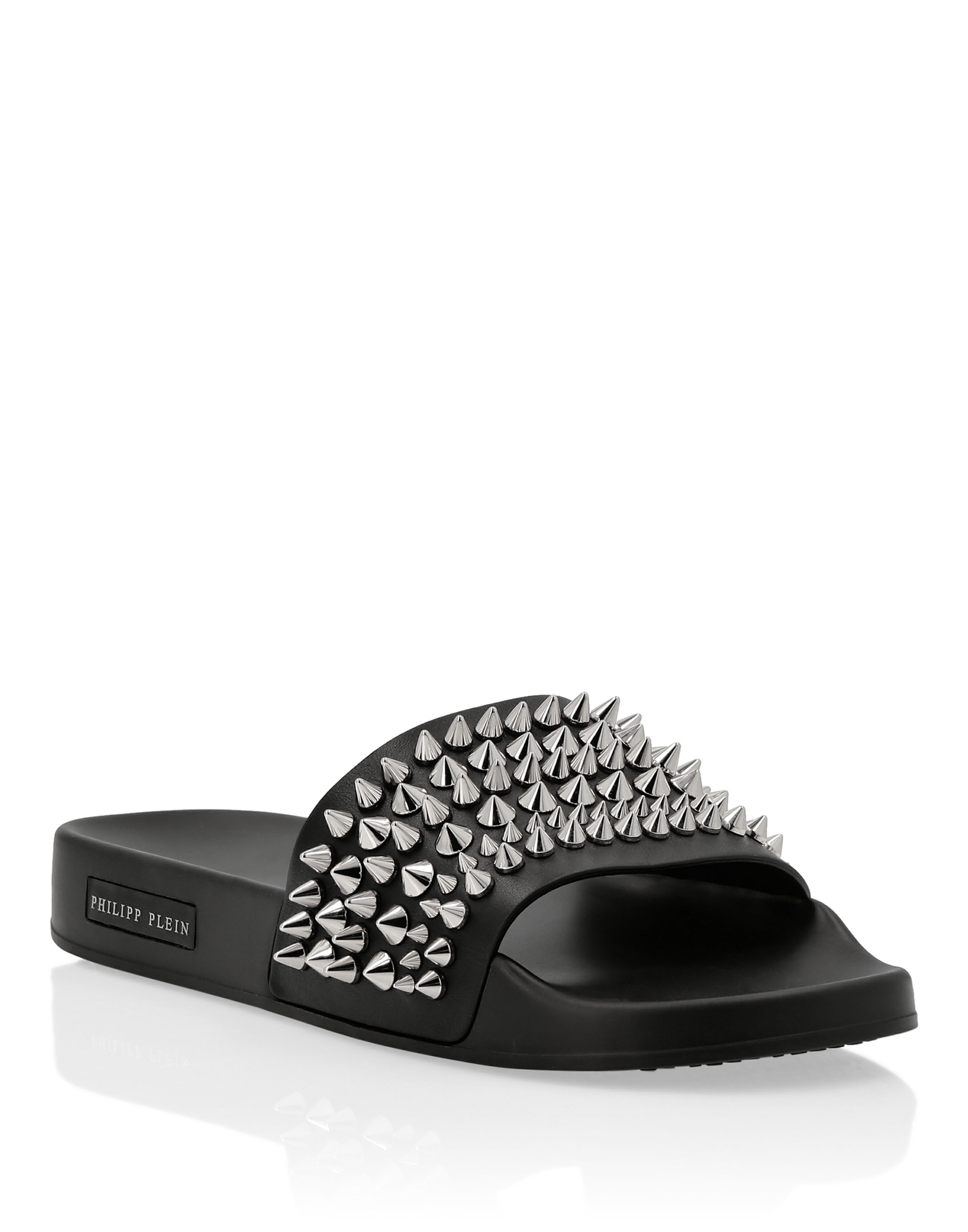 black flat sandals with silver studs